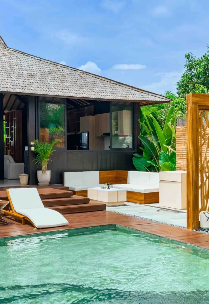Swimming pool and barbecue area in a contemporary Joglo-style villa in Bali