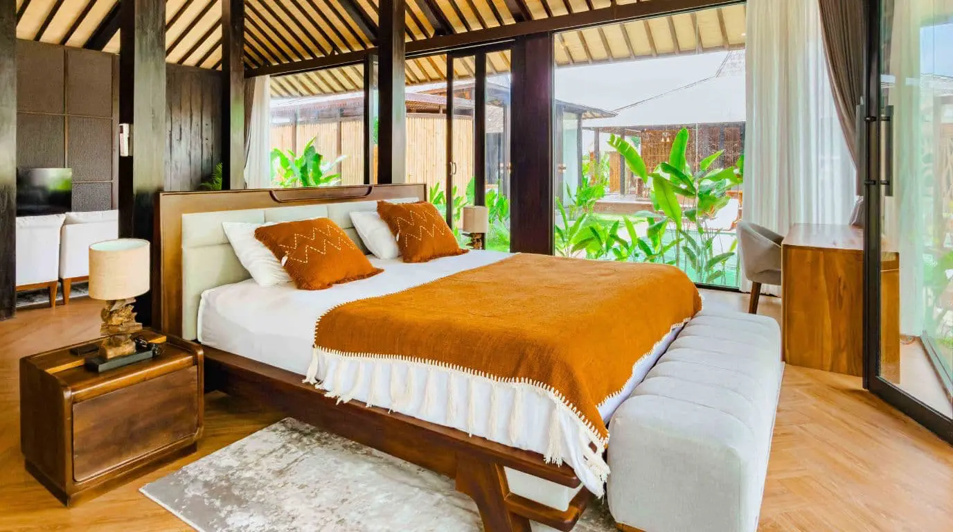 Master bedroom in a contemporary Joglo-style villa in Bali